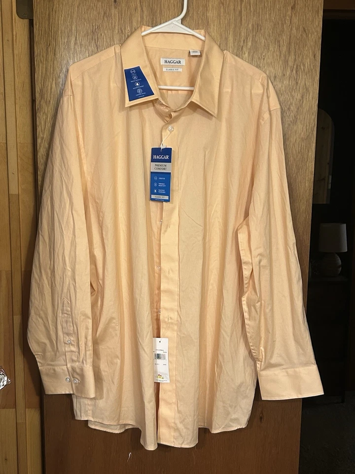 Camisa de vestir Haggar para hombre 18-18 1/2 (34/35) calce clásico melocotón abotonada. Nuevo con etiquetas. Foto 1 de 1