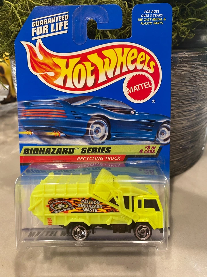 1997 Hot Wheels #719 Serie Biohazard 3/4 CAMION DEL RICICLO - Giallo - Immagine 1 di 1