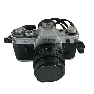 FOTOCAMERA VINTAGE CANON AE-1 #4481755 35MM CON OBIETTIVO 50MM E FLASH SPEEDLITE 155A - Foto 1 di 11
