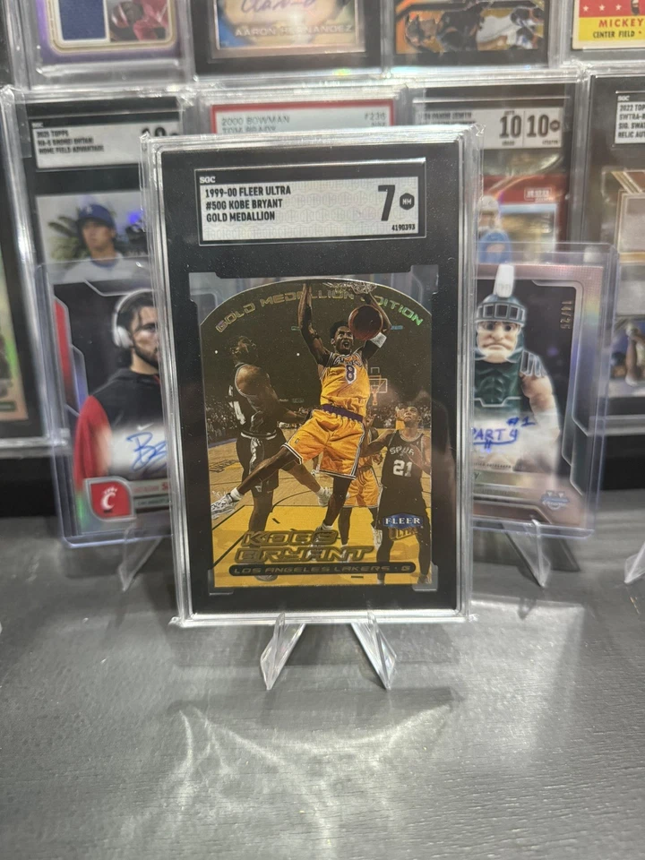 1999 Ultra Fleer Kobe Bryant Gold Medallion #50G SGC 7 Los Angeles  Lakers - Image 1 of 2