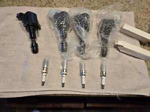 4X Ignition Coils + 4X Iridium Spark Plugs for Saturn Chevy Buick Pontiac UF491 - Picture 1 of 8