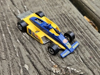 Mattel Hot Wheels F1 Kraco Stereo #18 Indy Race Car 1982 STP IndyCar Malaysia - Image 1 of 4