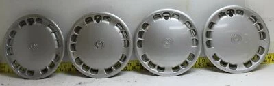Juego de 4 tapacubos de 14" usados OEM GA2K37170B 1993-1997 Mazda 626 (3436) Foto 1 de 4