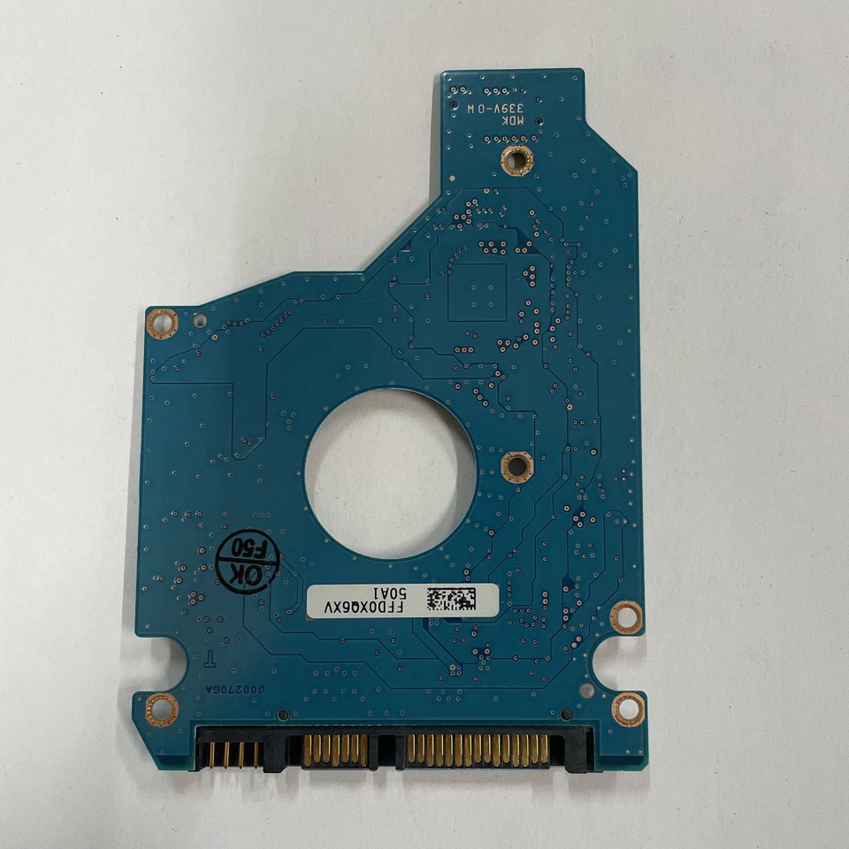 Toshiba G002706A 2.5" SATA HDD PCB Board 010 A0/GH101M HDD2J13 MK3265GSXN - Image 1 of 4