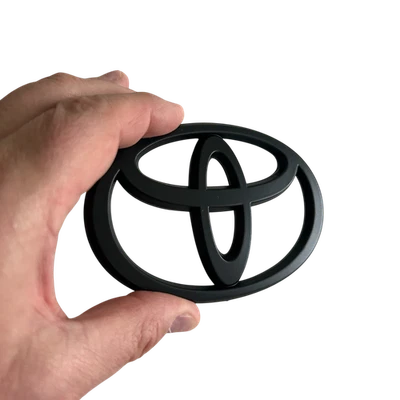 Logotipo de rejilla delantera insignia brillante emblema negro para Toyota Camry Corolla Matrix Foto 1 de 4