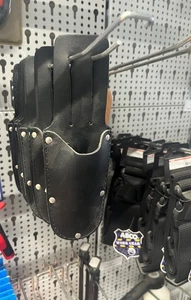 MESSERSCHEIDE   Leder  schwarz, runde Form   - Bild 1 von 1