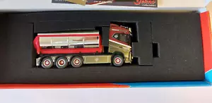 Tekno 75192 Volvo FH04 Globetrotter Truck 4axle with Hookarm & Asphalt Container - Picture 1 of 1