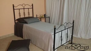 Letto singolo in ferro battuto Fiocco nero decorato oro - Foto 1 di 3