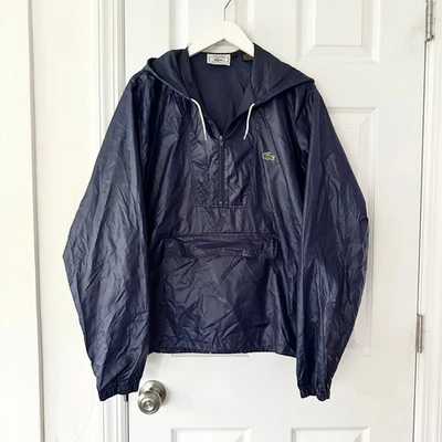Chaqueta cortavientos suéter vintage azul marino Lacoste Izod chaqueta con capucha empaquetable grande Foto 1 de 4