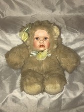 teddy bear with porcelain face