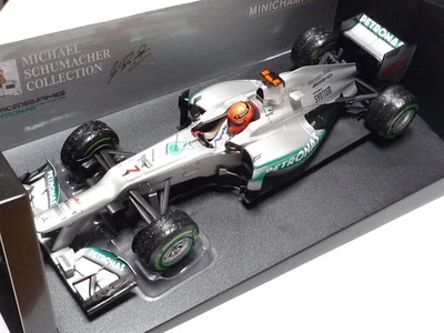 MINICHAMPS 1:18 MERCEDES W03 M. SCHUMACHER LAST RACE BRAZIL GP 2012 - Image 1 of 4