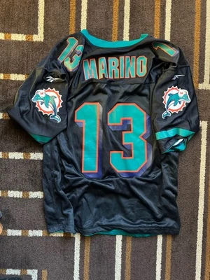 Camiseta Miami Dolphins NFL #13 Dan Marino Reebok reversível 46 preta aquática - Imagem 1 de 3