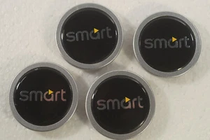 4 St. gebrauchte Smart Coupé Nabendeckel f. Sportline Alufelgen Nabenkappen - Bild 1 von 4