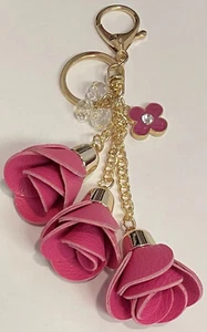 FLORALES HOT PINK KUNSTLEDER ROSA QUASTE GOLD KETTE STRASS KRISTALL TASCHENANHÄNGER - Bild 1 von 7