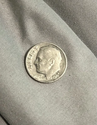 1976 d dime error off center observe  - Image 1 of 4