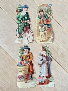 Lot de 4 Anciens Découpis / Chromo Père Noël Traineaux cadeaux 1900 - Picture 1 of 4