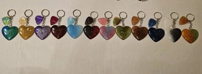 Llaveros de corazón de resina inspirados en Taylor Swift 🩷Hechos a mano💜Juego de 12 con fotos de guitarra Foto 1 de 4