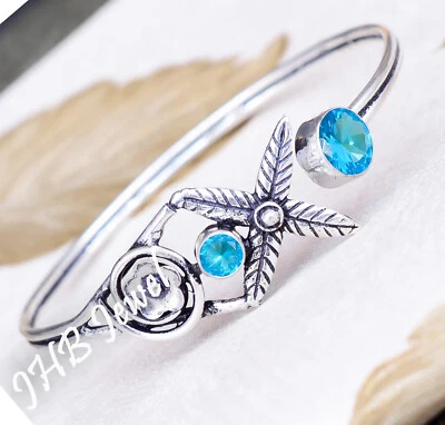 Brazalete brazalete de plata de ley 925 con piedras preciosas de topacio azul de Londres para regalo de cumpleaños Foto 1 de 4
