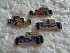 Job lot of 4 Classic F1 racing cars Ferrari Williams etc metal lapel pins