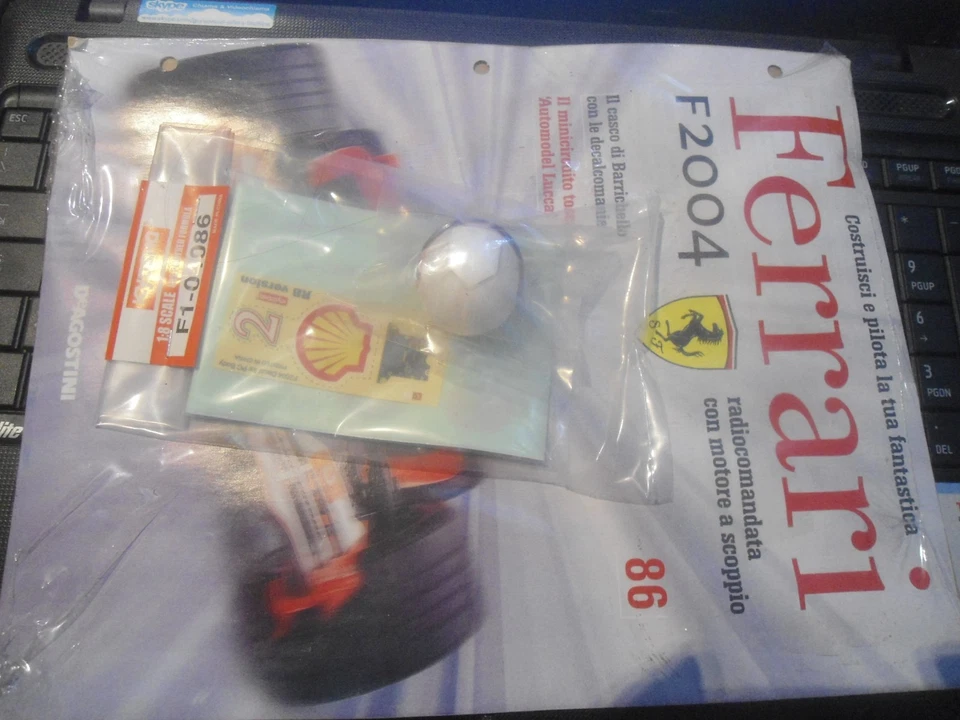 FERRARI F2004 KYOSHO  1/8 - DE AGOSTINI - RICAMBI RC - SCEGLI USCITE + FASCICOLO - Immagine 1 di 1