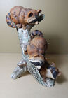 Vintage Masterpiece by HOMCO Porcelain Figurine Raccoons on Tree Stump