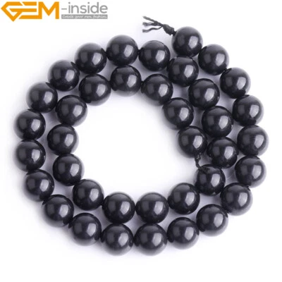 Cuentas sueltas pulidas de piedra shungita rusa negra natural para hacer joyas 15" Foto 1 de 4