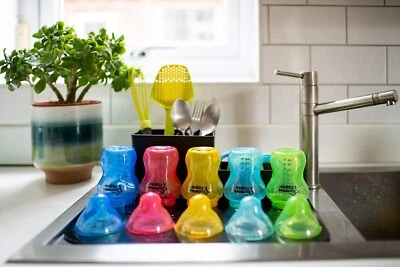 6 biberones bebé diferente color Foto 1 de 4