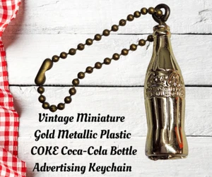 Vintage Miniature Gold Metallic Plastic COCA-COLA Bottle Advertising Keychain - Picture 1 of 6