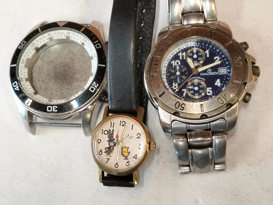 HAUREX & OTHER 2 PIECE 1 WATCH & 1 CASE MENS & WOMEN'S NOT WORKING PARTS PURPOSE - Image 1 of 4