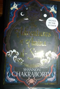 The Adventures of Amina al-Sirafi Shannon Chakraborty SIGNED 1st Ed Sprayed Rare - Picture 1 of 3