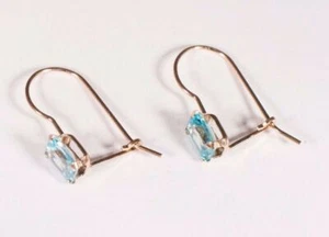 Pendientes de topacio azul de oro amarillo de 10 quilates con corte esmeralda - Imagen 1 de 3