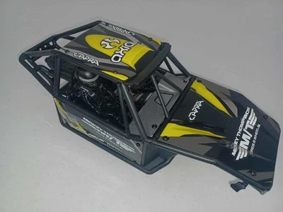 Axial Capra 4WS 1.9 Unlimited Trail Buggy Complete Body and Skid Plate, Yellow - Image 1 of 4
