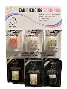 Studex Ear Piercing Earrings Display With 14 Pair Of Earrings. Gold And Silver