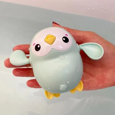Juguete de baño para bebés niños lindo pato pingüino huevo rociador de agua rociador agua juguetes para niños Foto 1 de 4