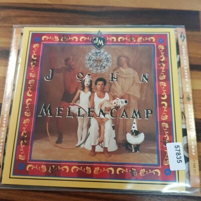 JOHN MELLENCAMP: Mr. Happy Go Lucky  PMDC GER  > VG+/VG+(CD) - Bild 1 von 2