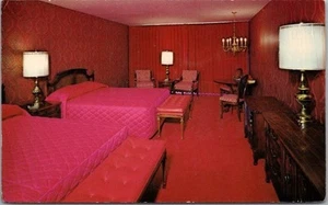 Tarjeta postal vintage de Little America Wyoming habitación motel vista interior década de 1970 sin usar - Imagen 1 de 2