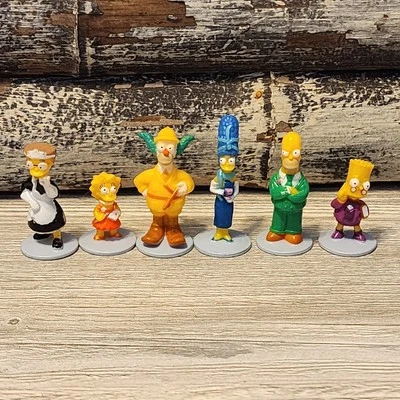 The Simpsons Clue Game Pieces - Game Tokens - set of 6 - item #5642-4 - Image 1 of 4
