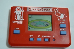 RARO 1985 CASIO CG-90 DIVERTIDO CIRCO ELECTRÓNICO PORTÁTIL LCD JUEGO JAPÓN - Imagen 1 de 3