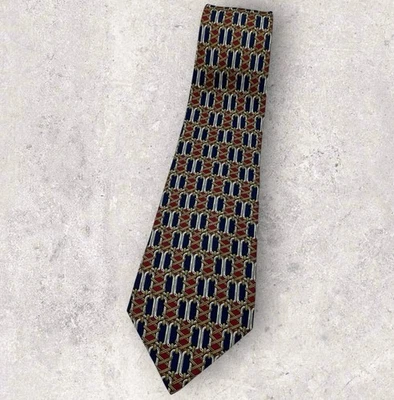 Corbata de seda CELINE ESPAÑA azul marino borgoña beige geométrica con:3,7" usada en excelente estado Foto 1 de 4