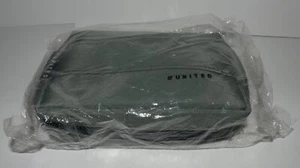KIT DE AMENIDADES UNITED AIRLINES GRIS NUEVO SELLADO - Imagen 1 de 4