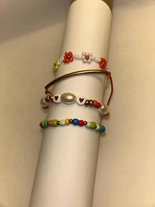 4er Set Gold und Bunt Perlen Armband Stapel - Bild 1 von 2