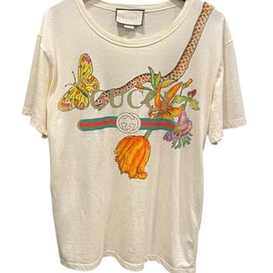 T-shirt Gucci stampa logo lavorata danneggiata 492347 cotone manica corta r3_0713 - Foto 1 di 12