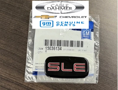 NEW GM OEM EXTERIOR- CAB- EMBLEM BADGE SLE  NAMEPLATE GMC 15036134 - Image 1 of 2