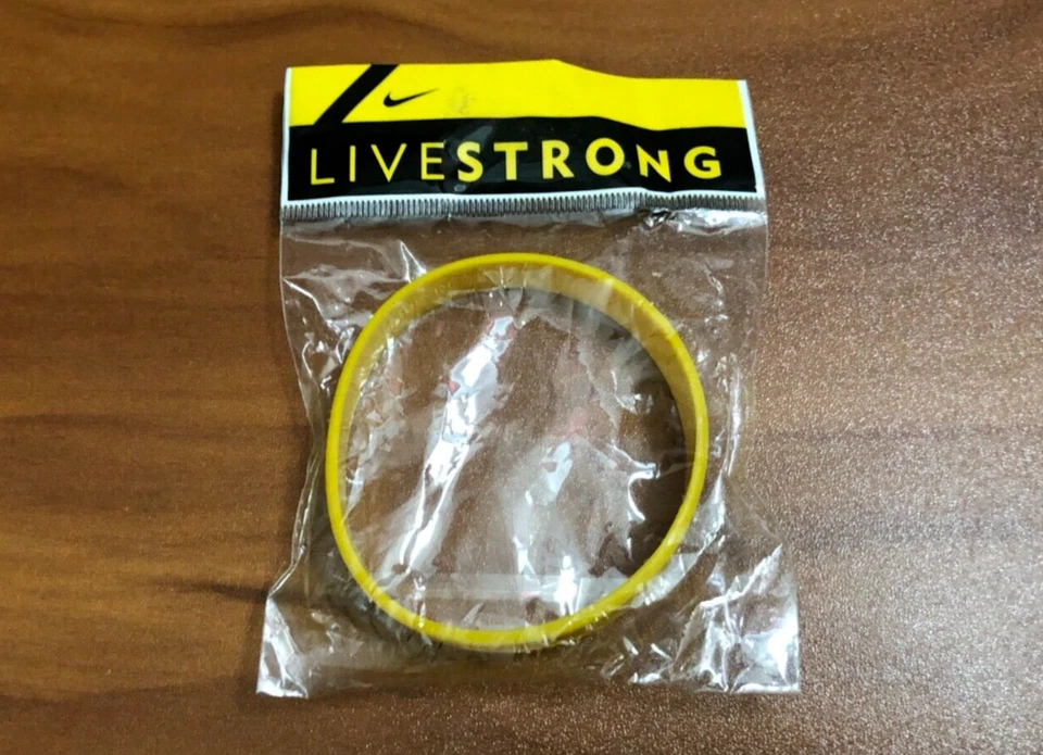 NIKE LIVESTRONG RUBBER WRISTBAND WEAR YELLOW LANCE ARMSTRONG FOUNDATION
