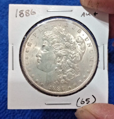 1886 Morgan Silver Dollar Almost Uncirculated Condition (65) Cover
