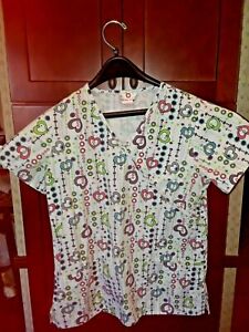 SCRUB WHITE CROSS SIZE M WITH COLORED HEARTS IN BEAUTIFUL CONDITION 