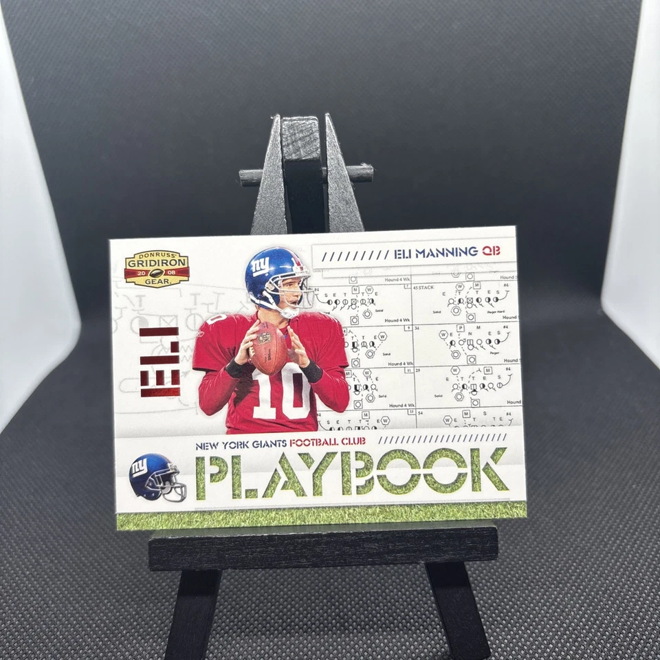 2008 Donruss Red Gridiron Gear Playbook Card of Eli Manning - Giants - Image 1 of 3