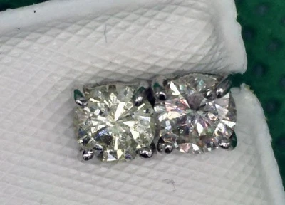 PLATINUM 1.00CTW PAIR ROUND DIAMOND SOLITAIRE STUD EARRINGS - Image 1 of 4