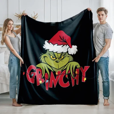 Acogedora manta polar negra con gráfico de nombre Grinch personalizada Foto 1 de 4