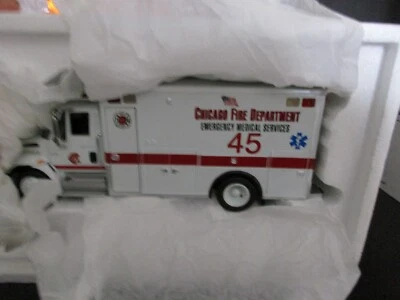 2004 FIRST Gear-" CHICAGO FIRE DEPT. " INTERN.  4400 WITH EMS/RESCUE BODY 1:34 - Image 1 of 4